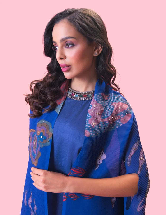 Model wearing the 'BRAHMAND BLUE' kurta set with a straight-fit Dola silk kurta, matching pants, and a statement printed georgette cape.