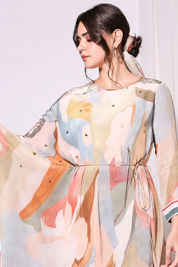 Multi-colour Conversational Printed Asymmetric Kurta Set in slub silk featuring delicate embroidery, a waist tie-up, and an elegant contemporary silhouette for women.