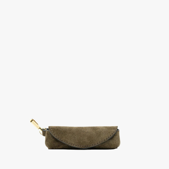 STOW London's Lipstick Case in Dark Green suede leather on a light grey background featuring a gold-coated stainless steel clip