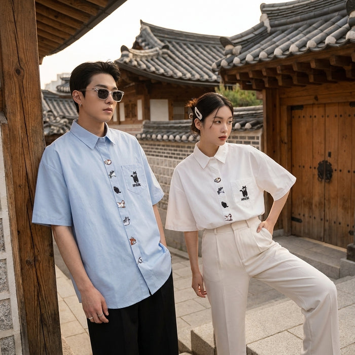 Chemise oversize style collège en coton, blanc ou bleu, pour un look K-fashion décontracté.