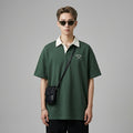 Polo oversize bicolore vert et gris avec col brodé. Style streetwear K-fashion. - Taille M