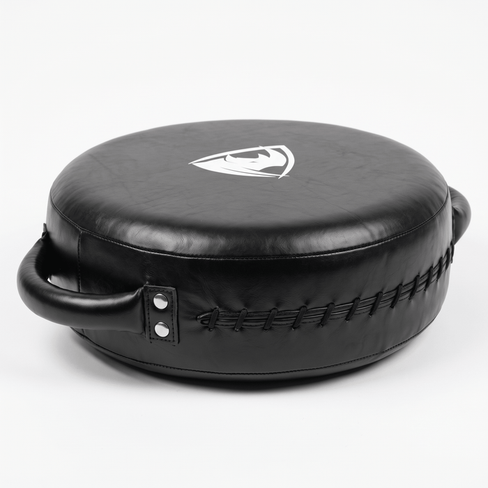 PROLAST round punch shield in black, rear side view showing the laced seam and padded handle