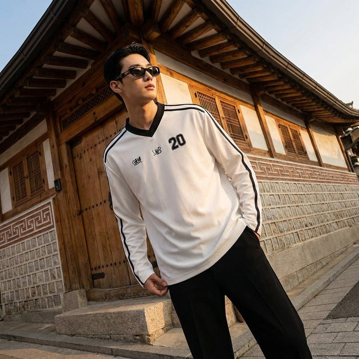 T-shirt homme loose imprimé rayures, style streetwear coréen. Disponible en noir et blanc.